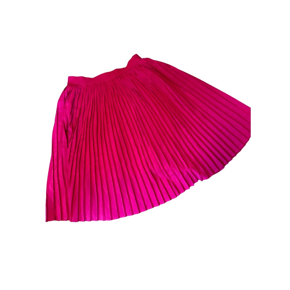 A New Day, pink pleated skirt